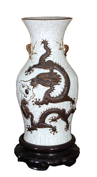 A pair of ceramic vases with dragon decorations