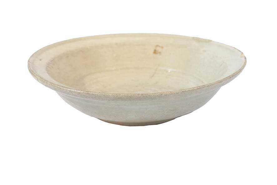 A large celadon dish (chips repaired)