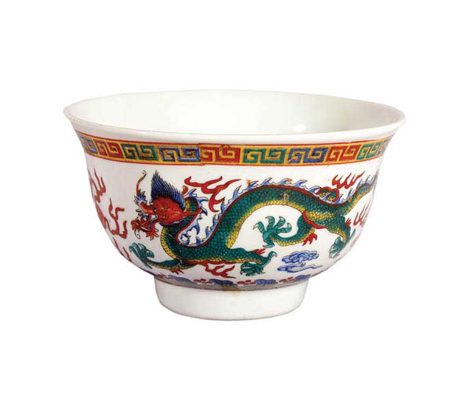 A ceramic green dragon bowl