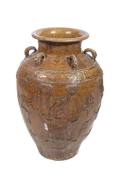A Qing molded brown glazed storage jar 