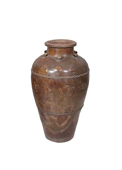 A brown glazed storage jar