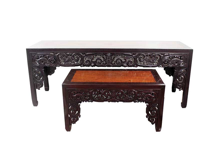 A set of two wooden carved altar tables