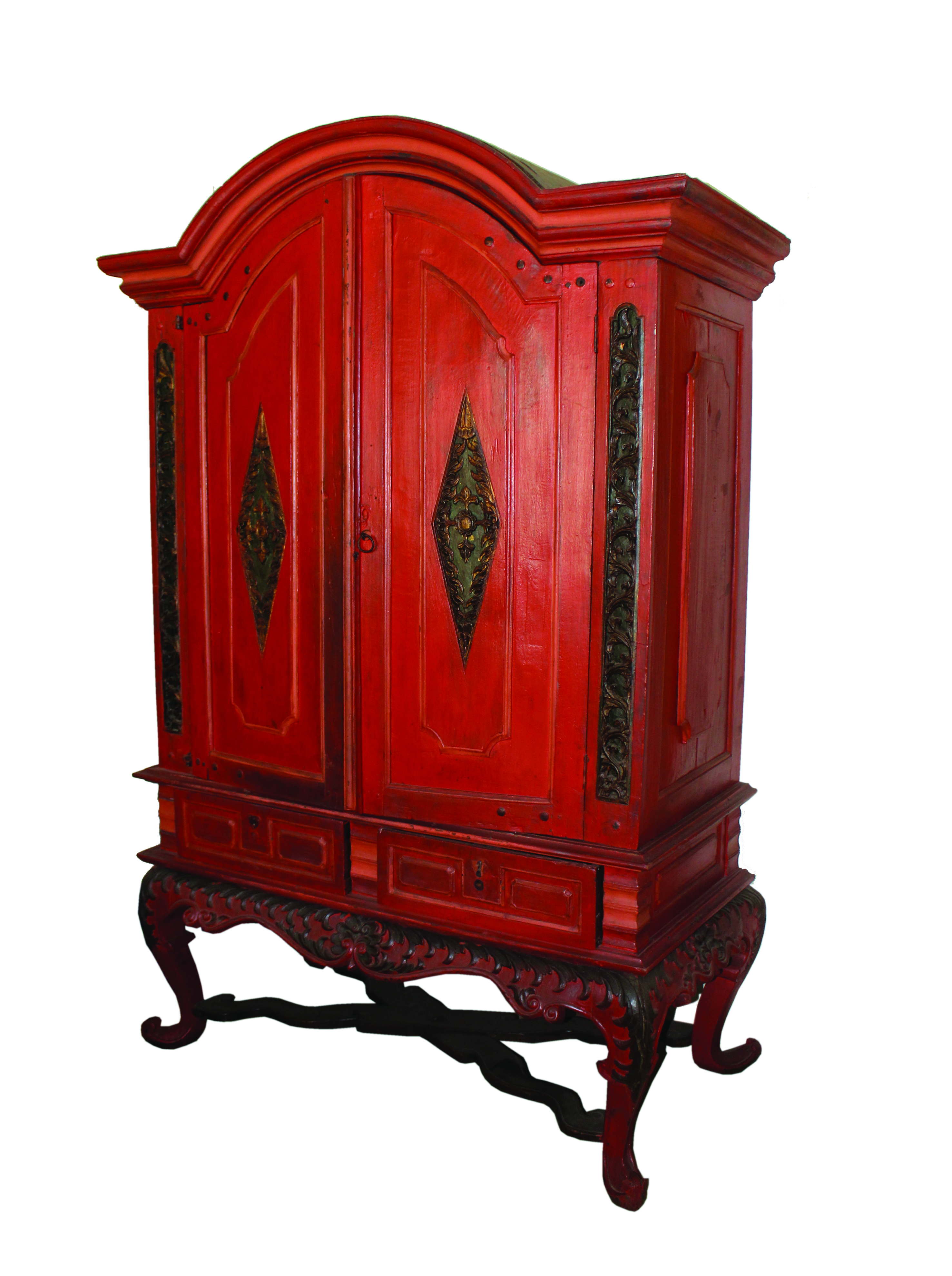 A red colonial wooden cabinet with two doors