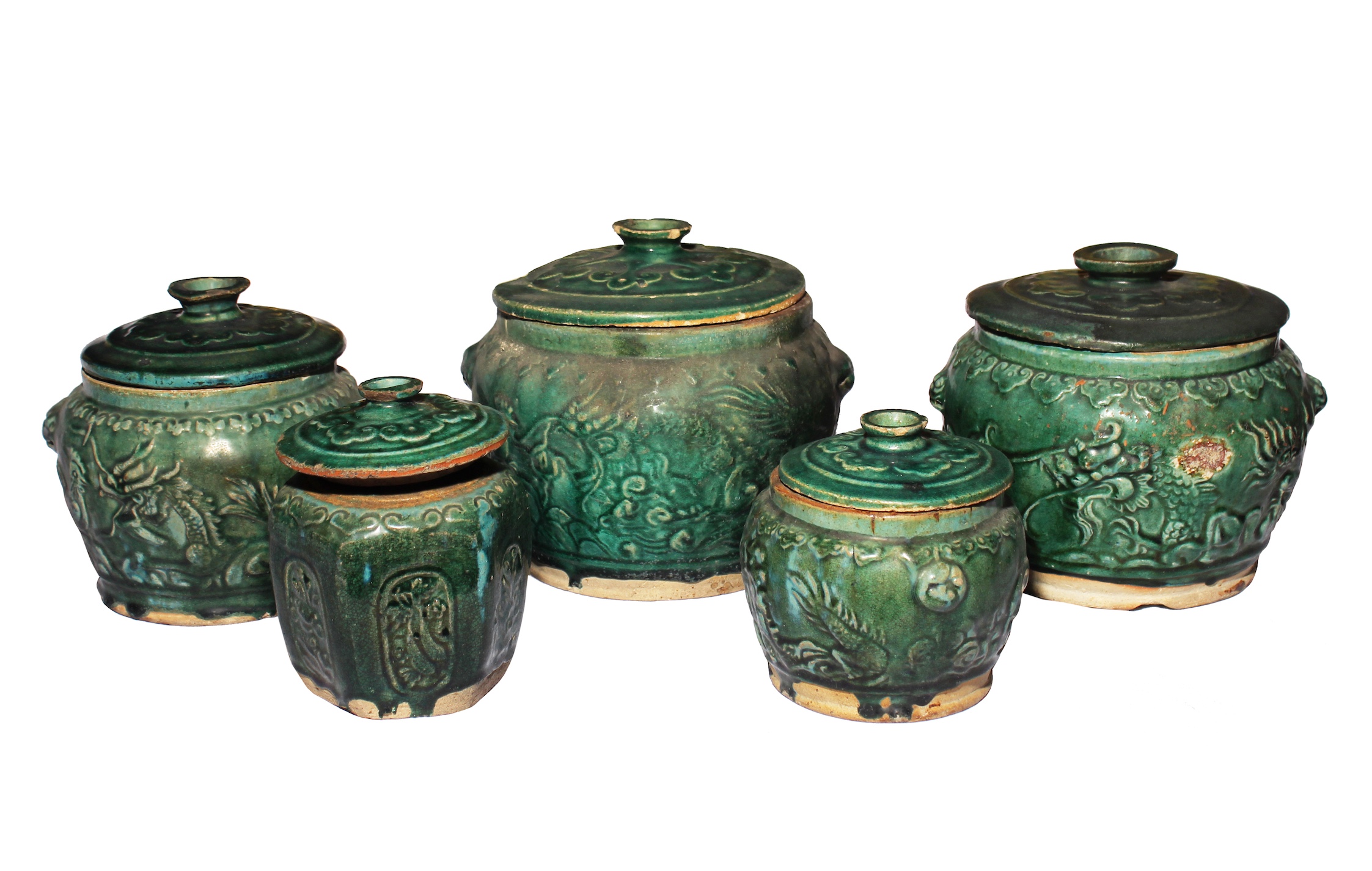 A group of five pieces late qing Shiwan green glazed covered jars