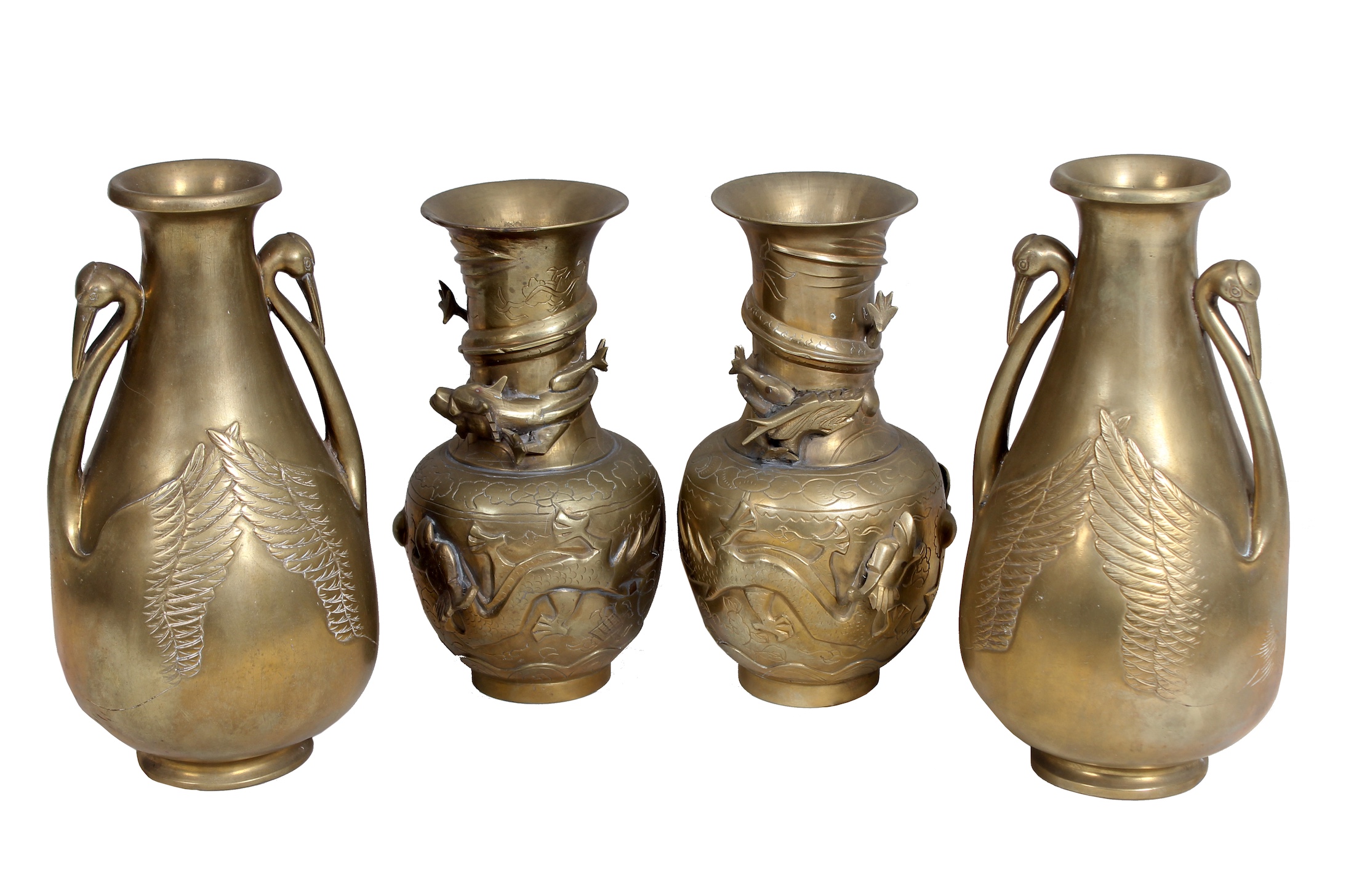 A group of four brass consisting of Two 19th - 20th century Chinese brass vase with coiling dragons and two 20th century brass vase with swan handles