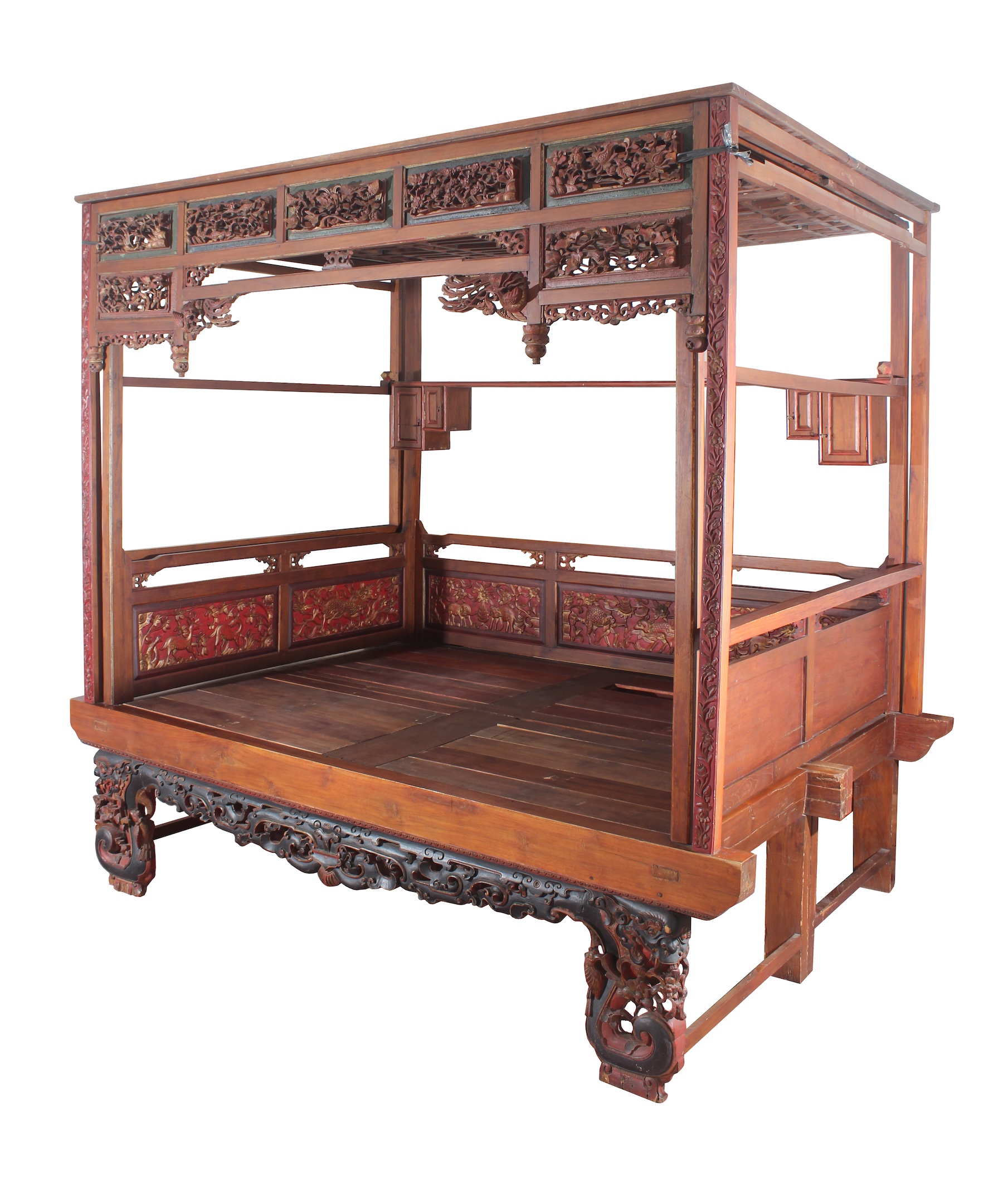 A brown gilt teakwood peranakan carved bed