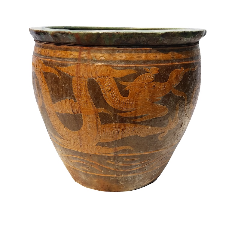 A late 19th early 20th century Chinese water pot jardiniere with dragon yellow ochre