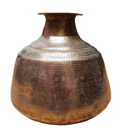 An engraved brass jar