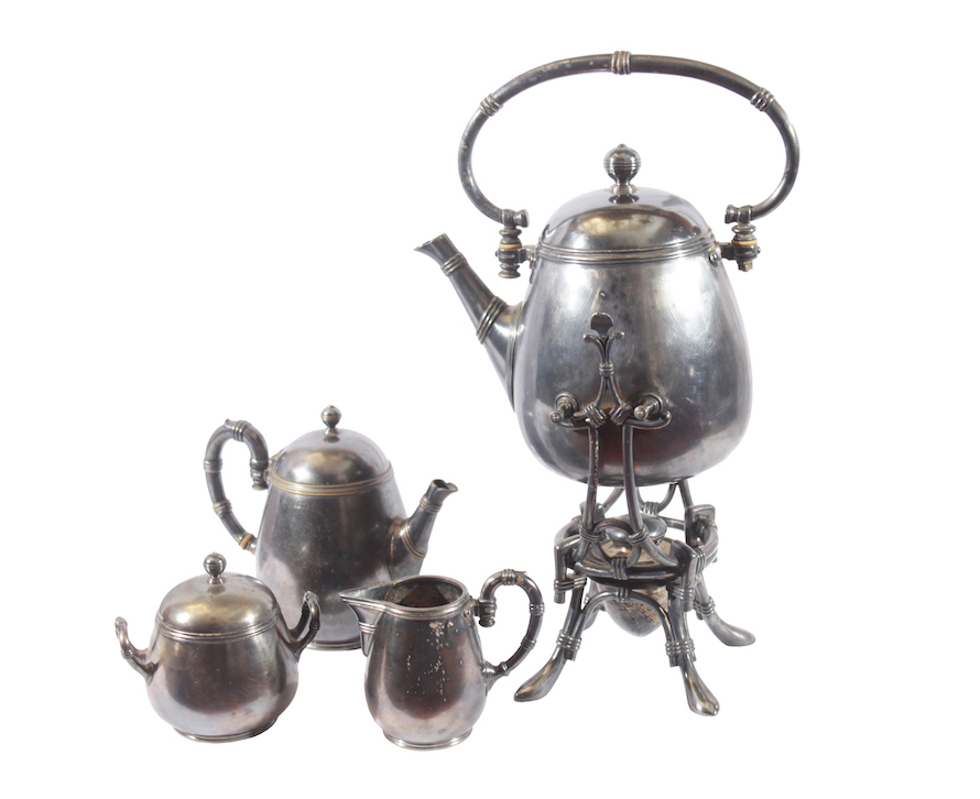 A set of silver plated tea set consisting of a teapot with iron stand, a coffee pot, a sugar pot and a milk pot