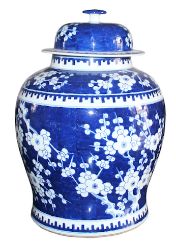 A vintage Chinese reverse blue plum blossom covered jar