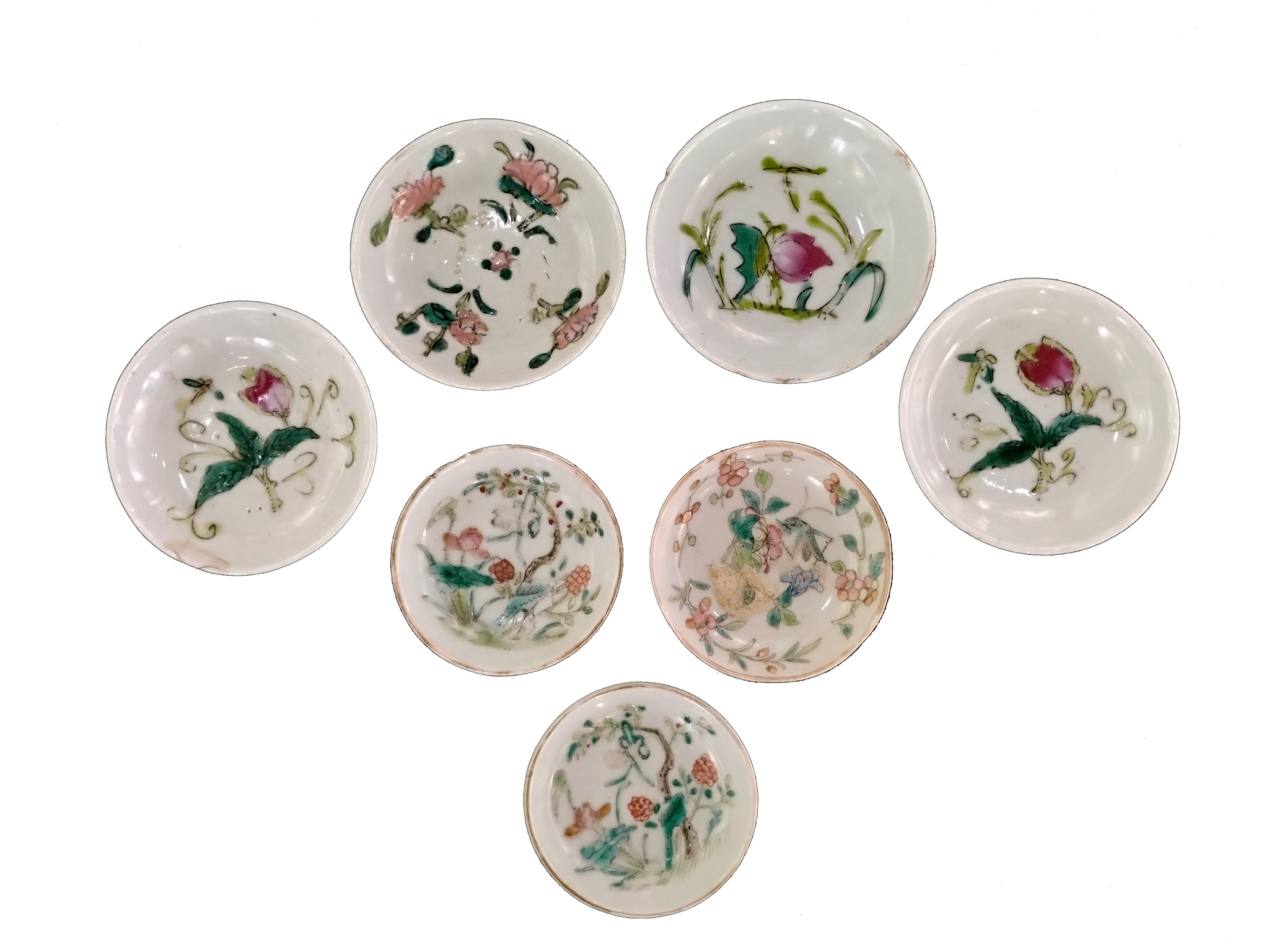 Seven pieces of late Qing early republic famille rose verte 
 saucers with Cheng Xie Sheng Mark