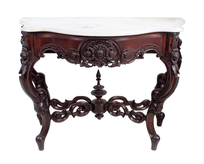 An early 20th century carved teak console table with marble top