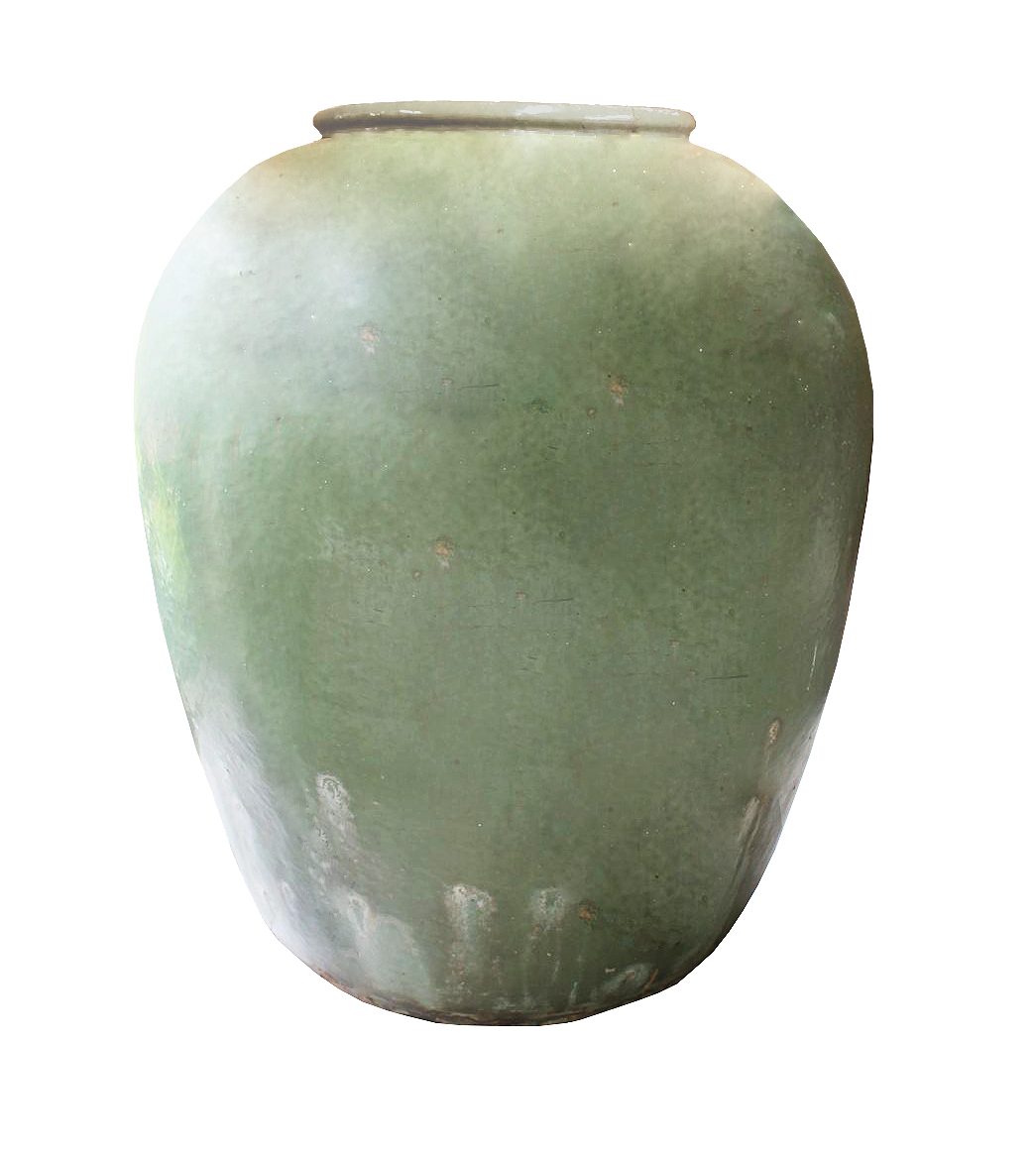 A green glazed stoneware storage jar