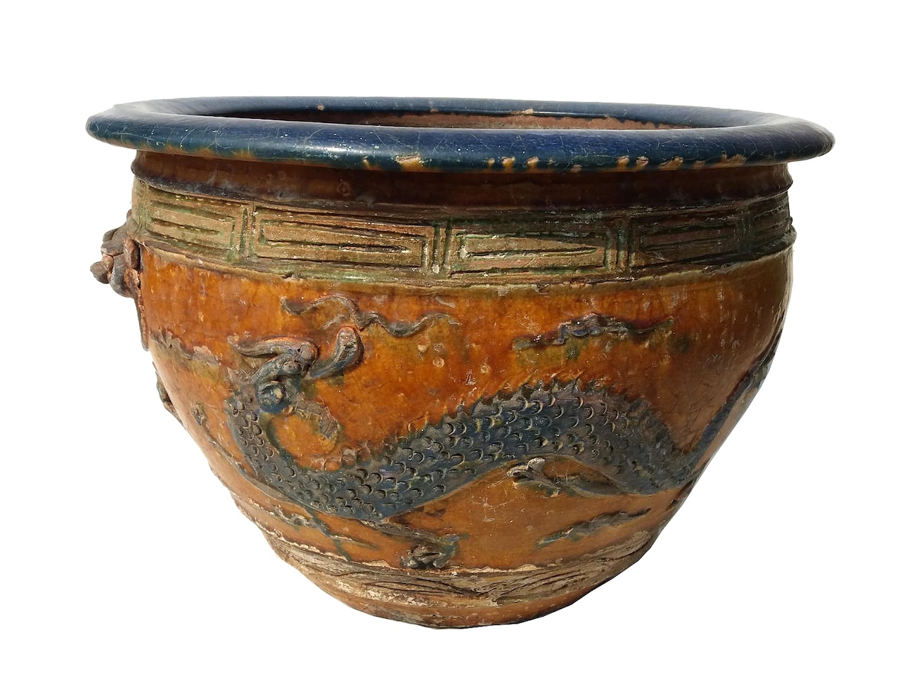 A 19th century late Qing Chinese jardiniere decorated with dragons in yellow ochre