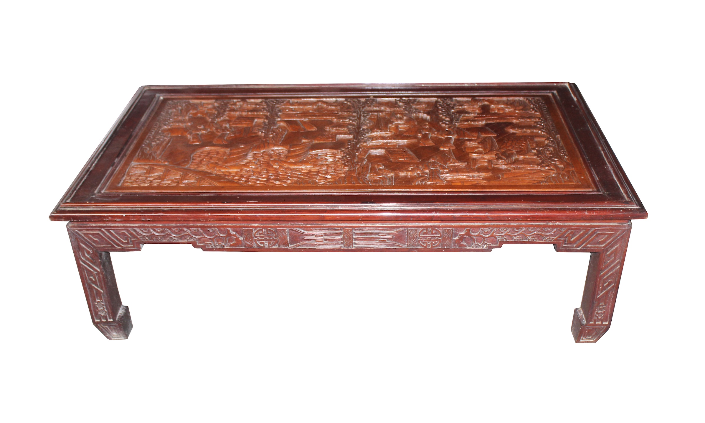A Chinese coffee table with carved top, and carved apron on four sides on straight legs