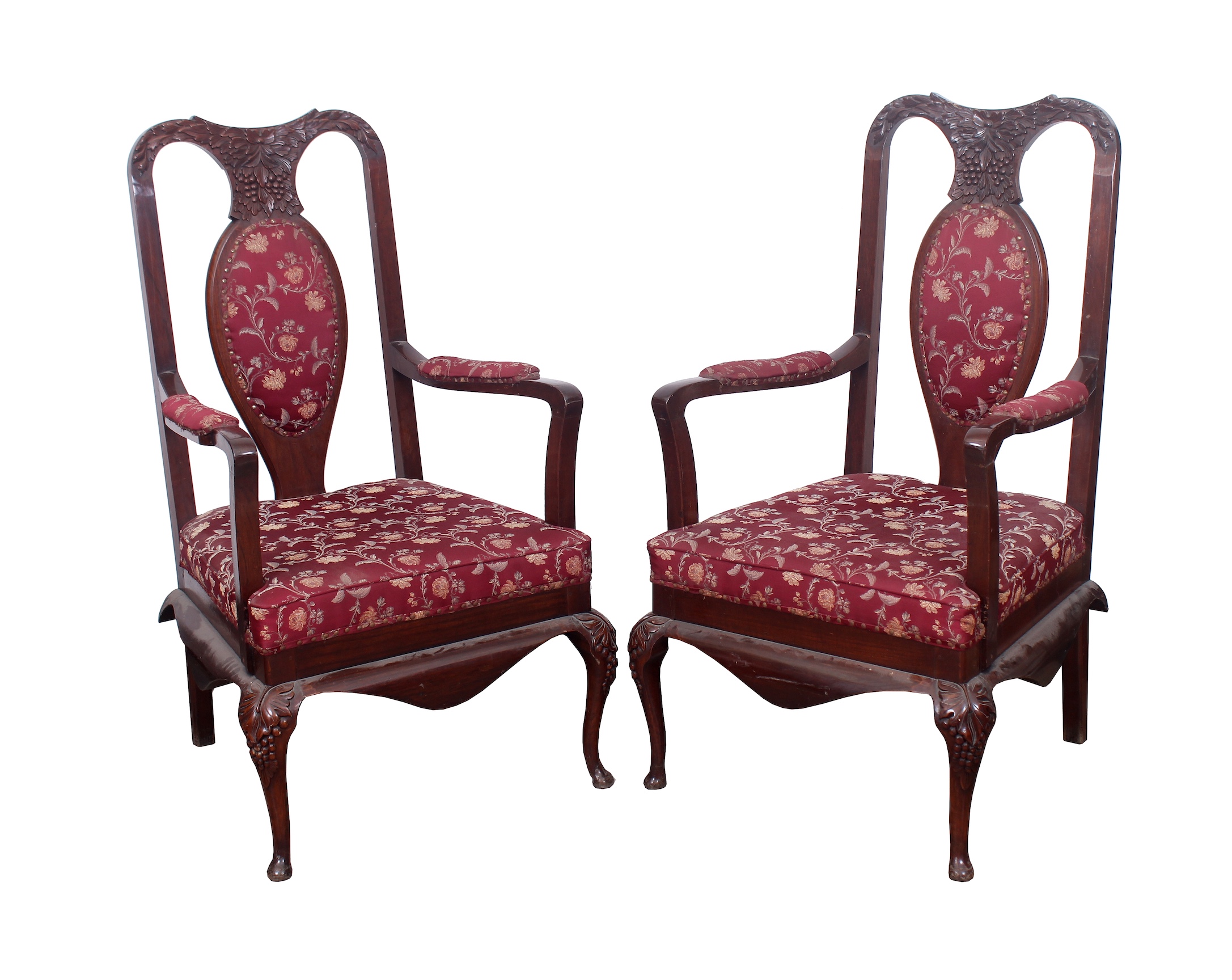 A pair of second half 20th century teak armchairs with red upholstered chairs