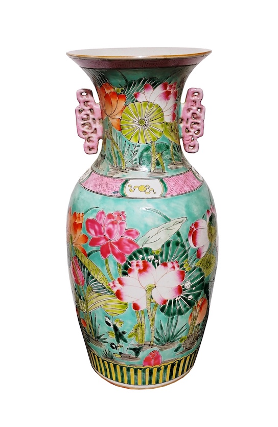 A 20th century Chinese famille rose vase painted with lotus on green ground