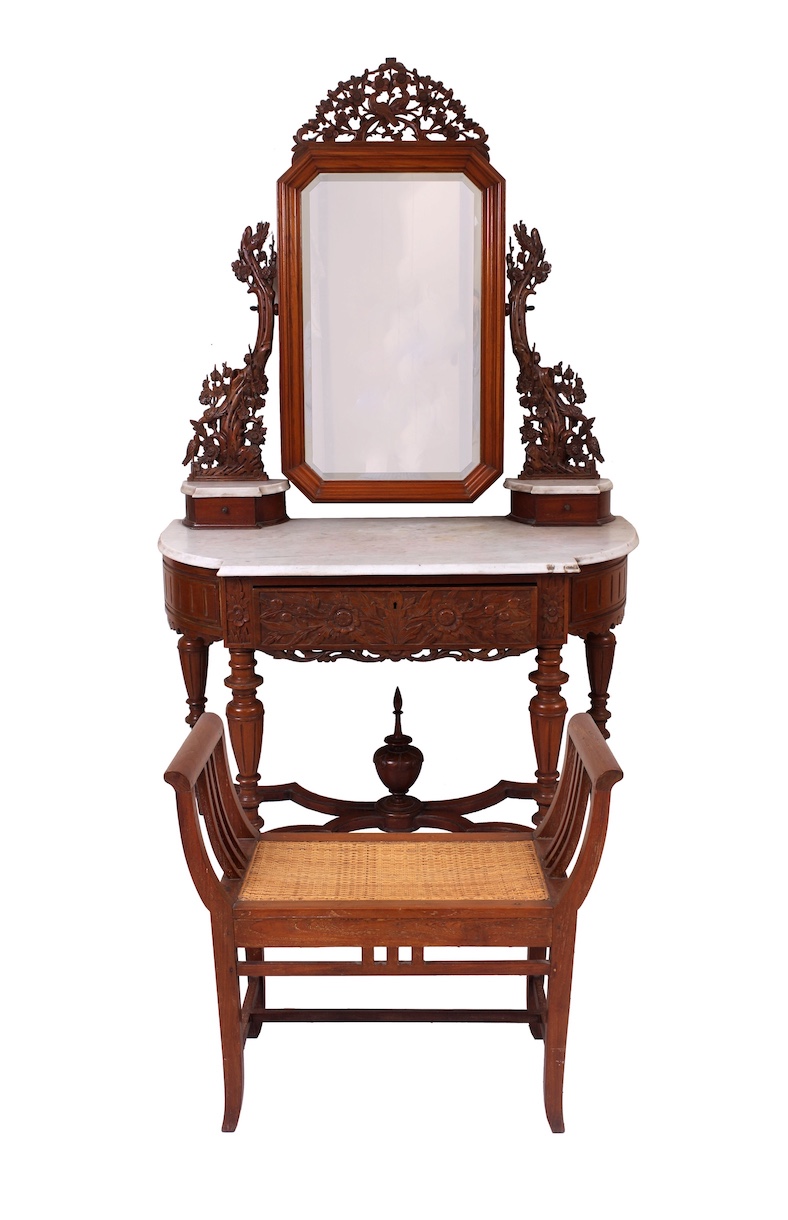 A set of 19th to early 20th century carved teak dressing table and stool