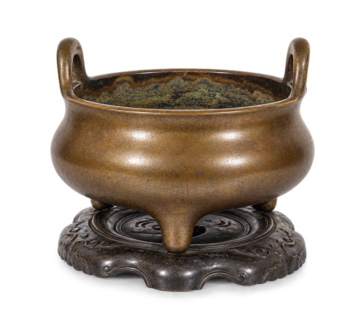 A Qing 17th - 18th century large Chinese bronze tripod censer with stand