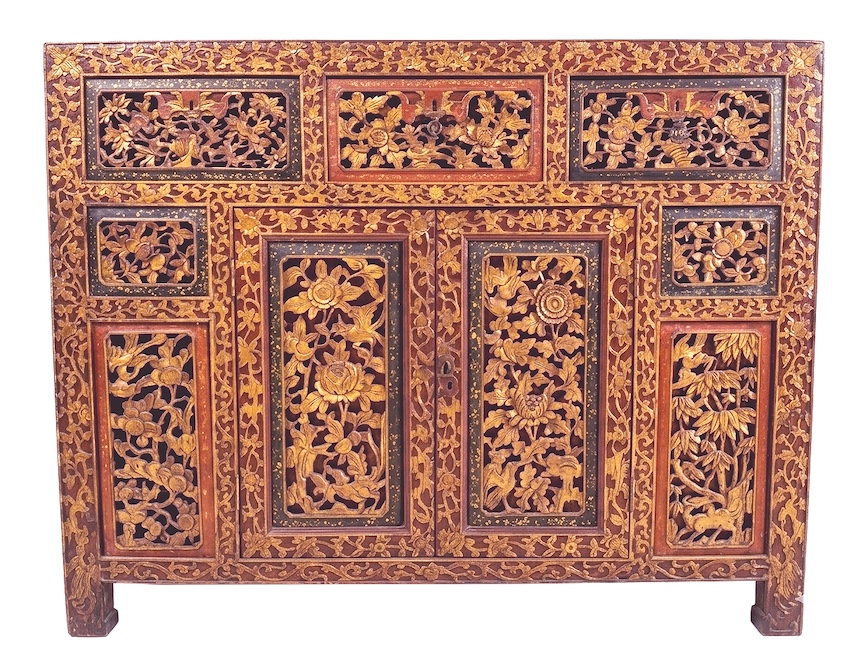 A 19th early 20th century peranakan Chinese carved red and gold sideboard