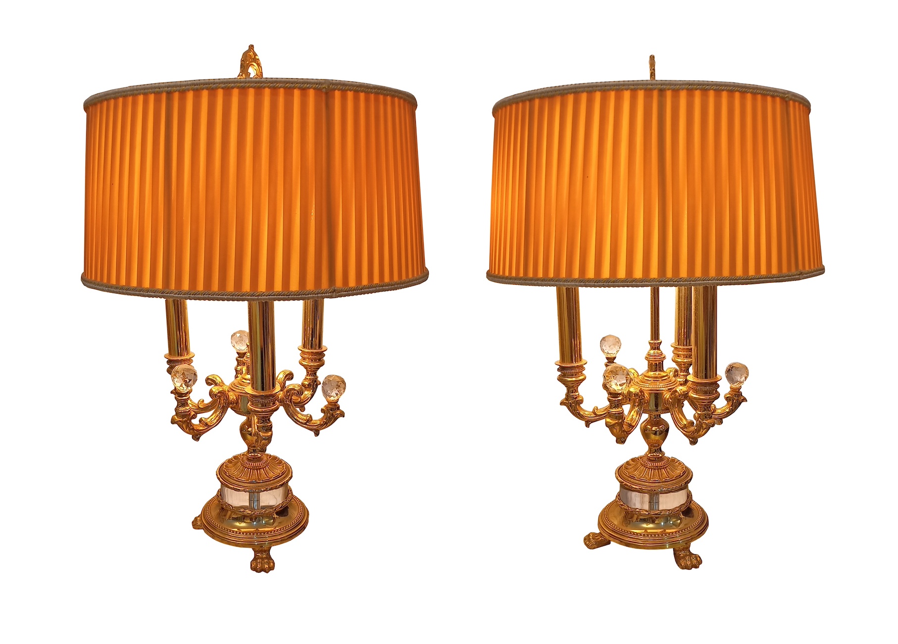 A pair of brass table lamps with fabric shades circa 1980’s