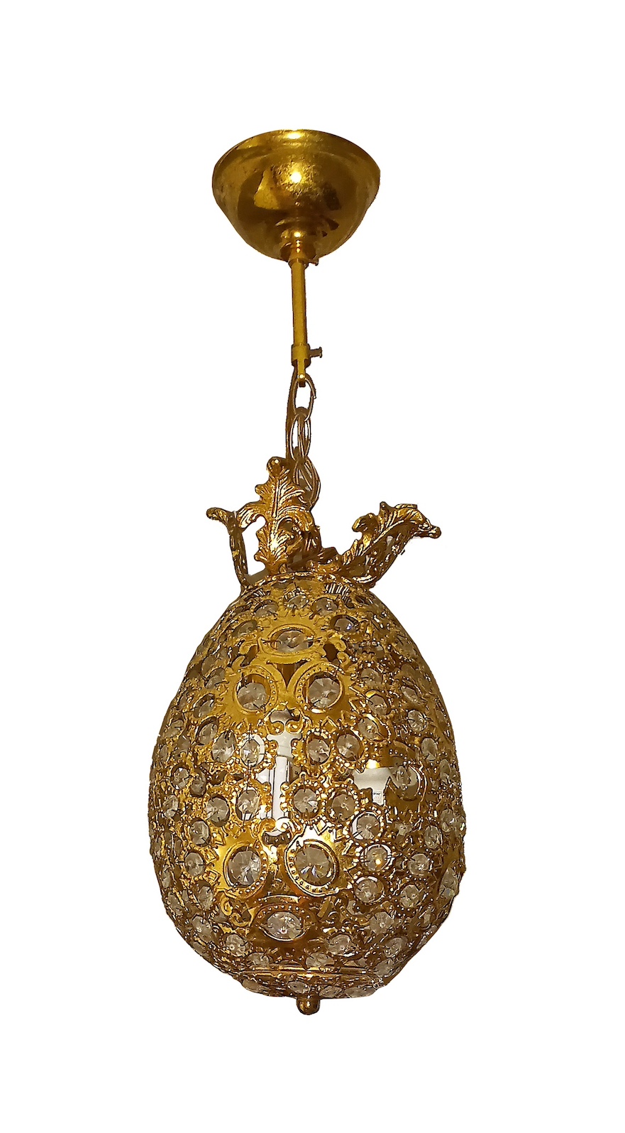 A reticulated brass pineapple form hanging lamp