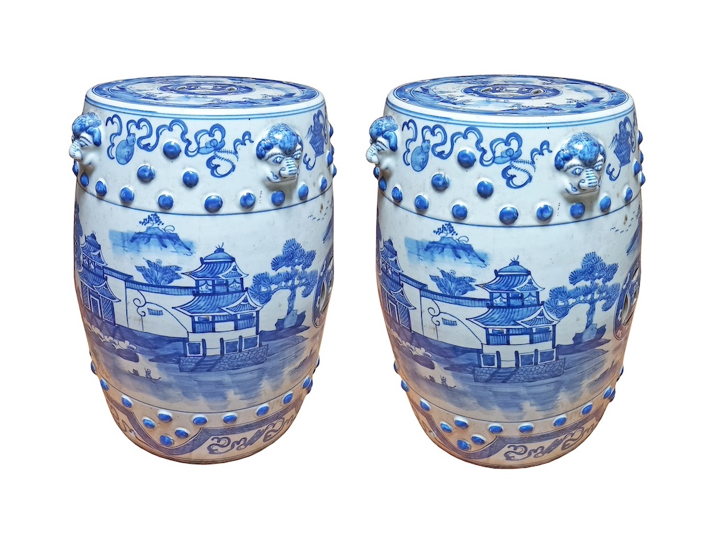 A pair of Chinese blue and white barrel shaped stools