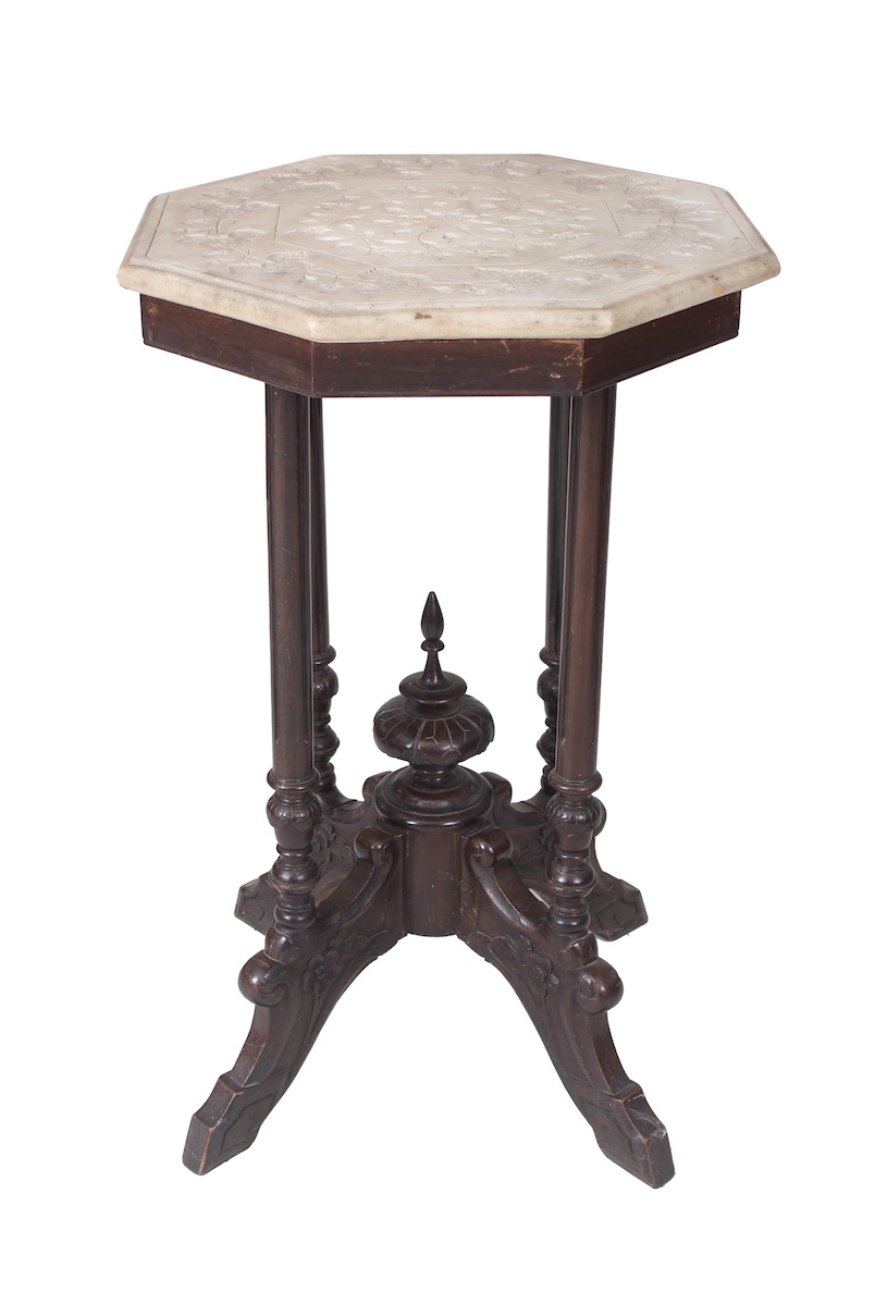 An early 20th century carved teak small table with octagonal marble top