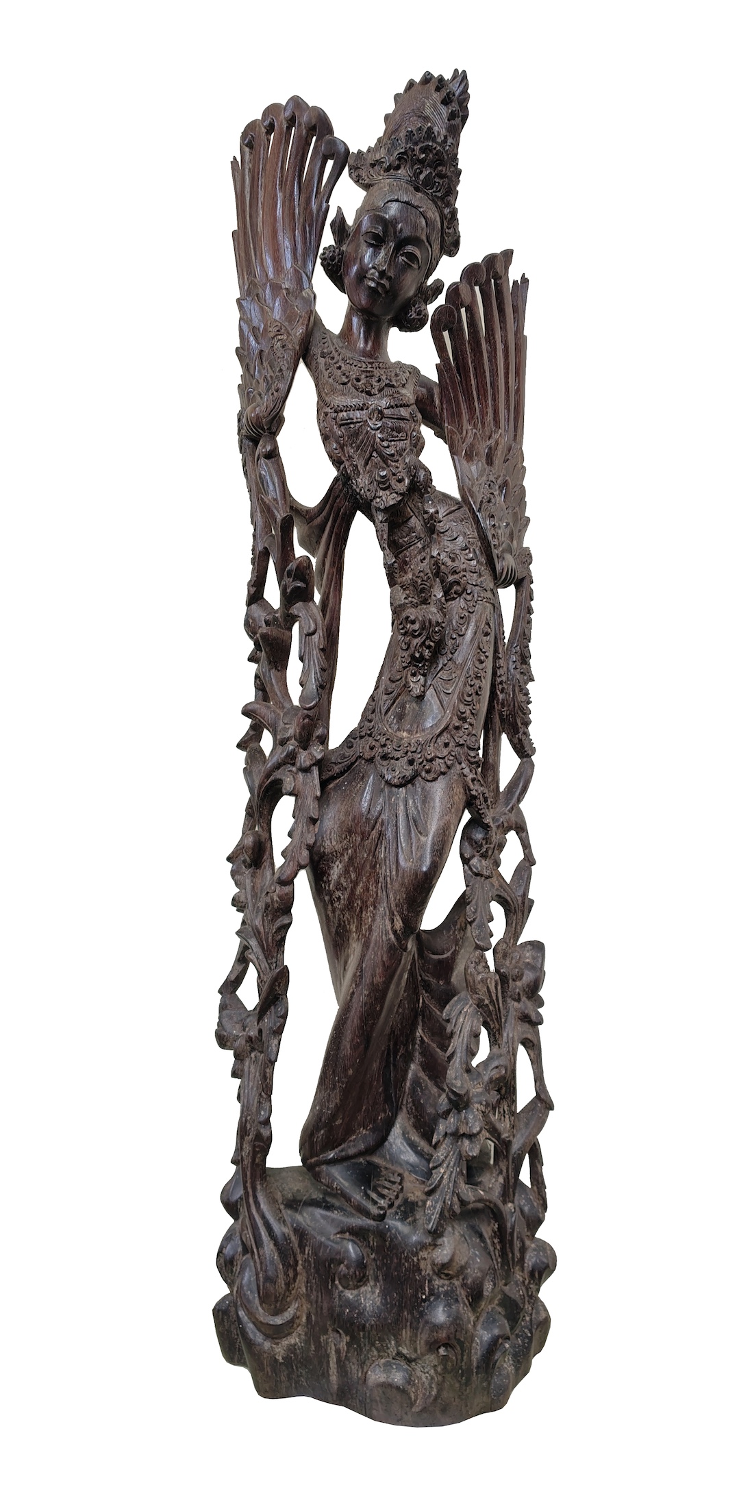 A carved rosewood figure of standing Balinese dancer