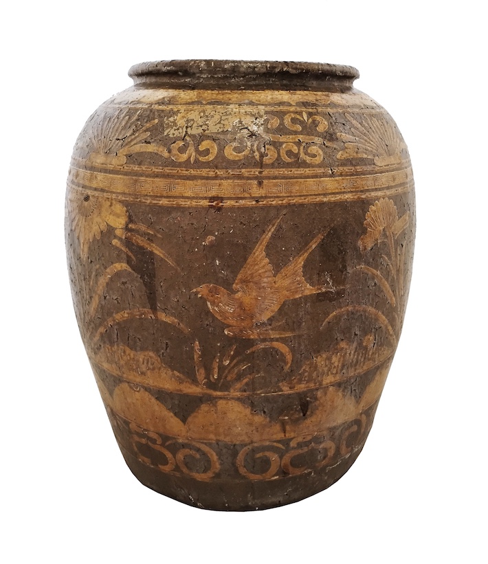 A 19th early 20th century Chinese storage jar with yellow ochre decoration