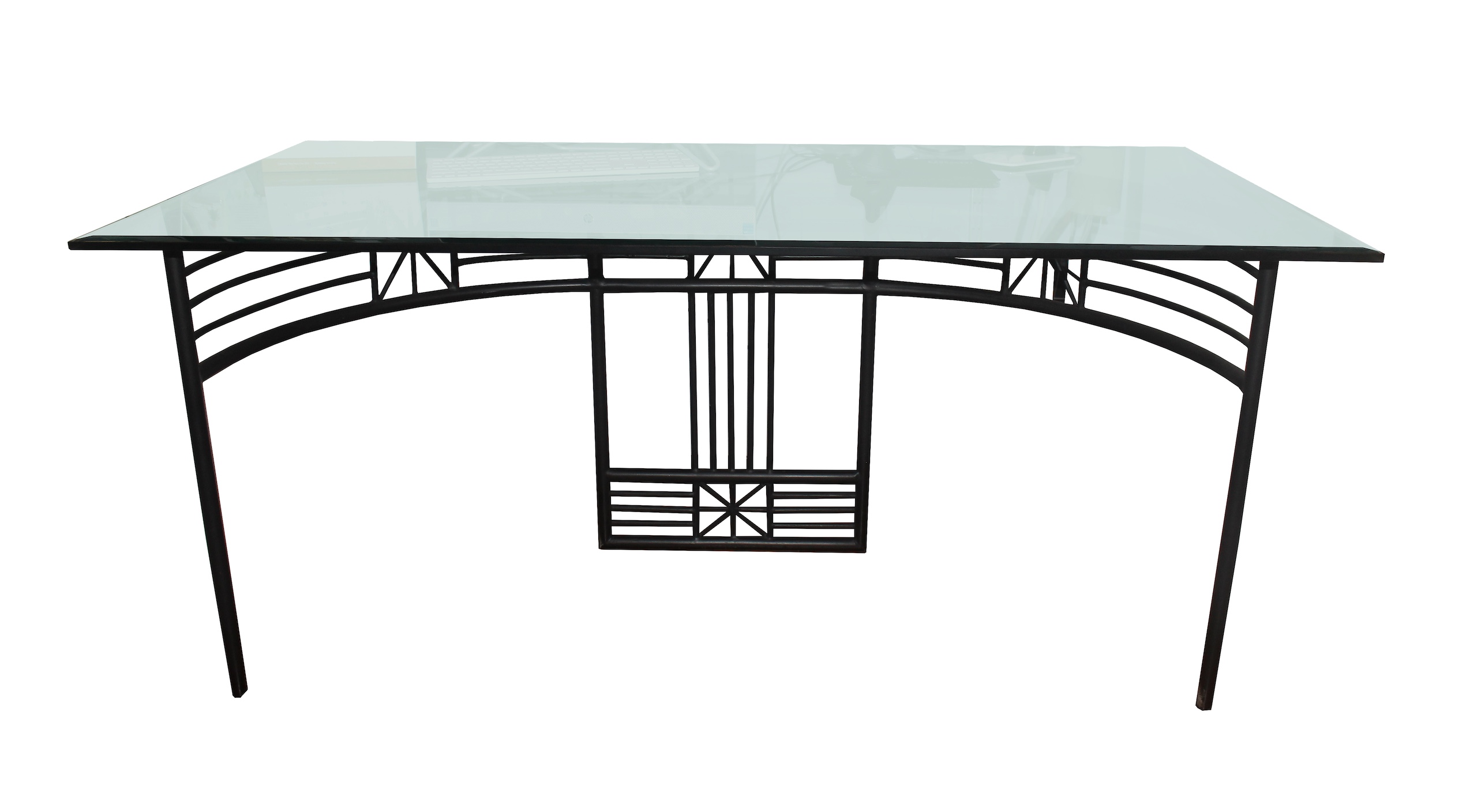 A glass table with iron frame